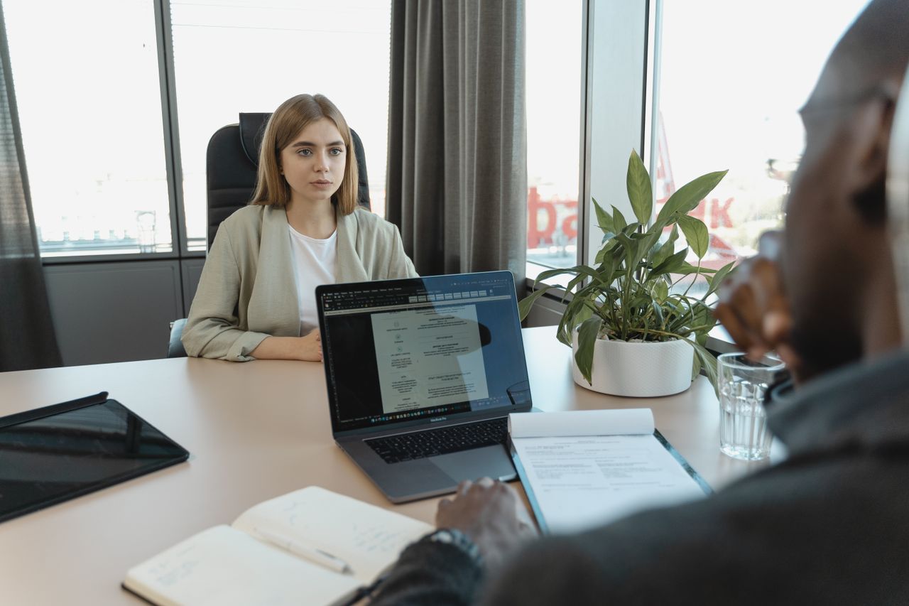 services-02 A professional job interview scene in a modern office setting, emphasizing recruitment and career opportunities.